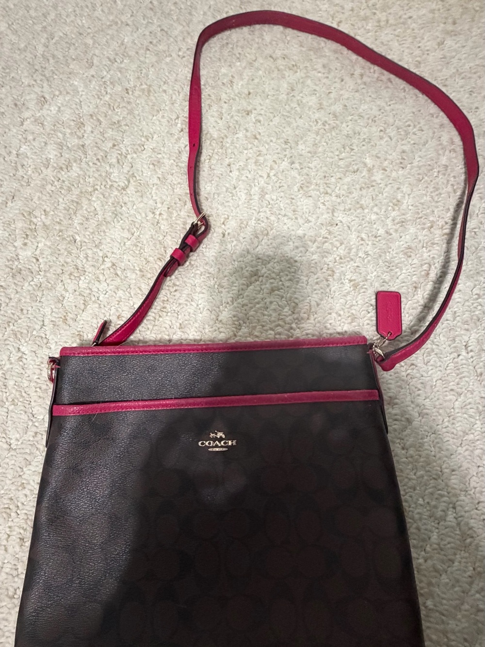 Coach Dark Brown Signature Crossbody with Pink Trim handles a bit worn and used